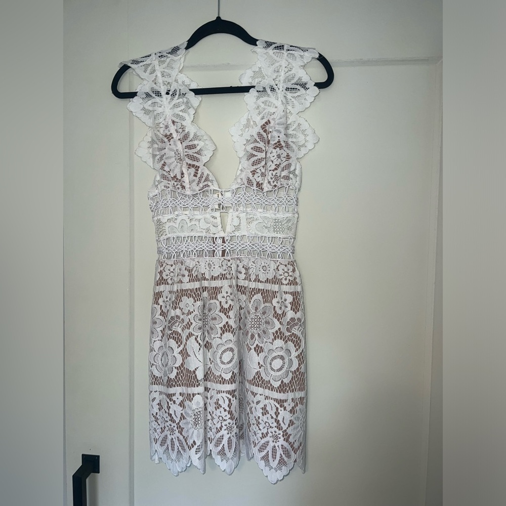 White lace For Love & Lemons dress.